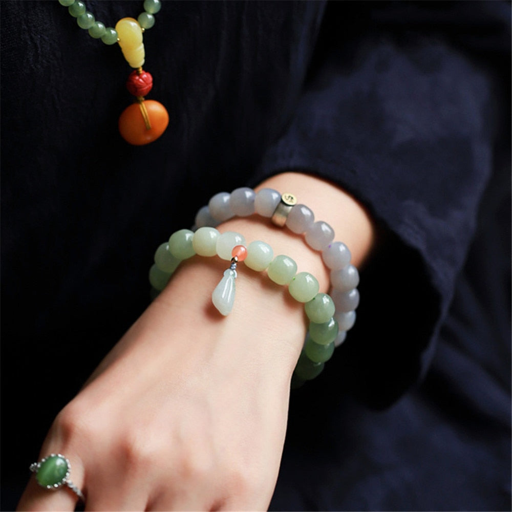 ䷊ Grande Paix • Le Đạo 道 du Changement avec la Racine de Lotus • Bracelet de Jade de la Montagne Qinghai