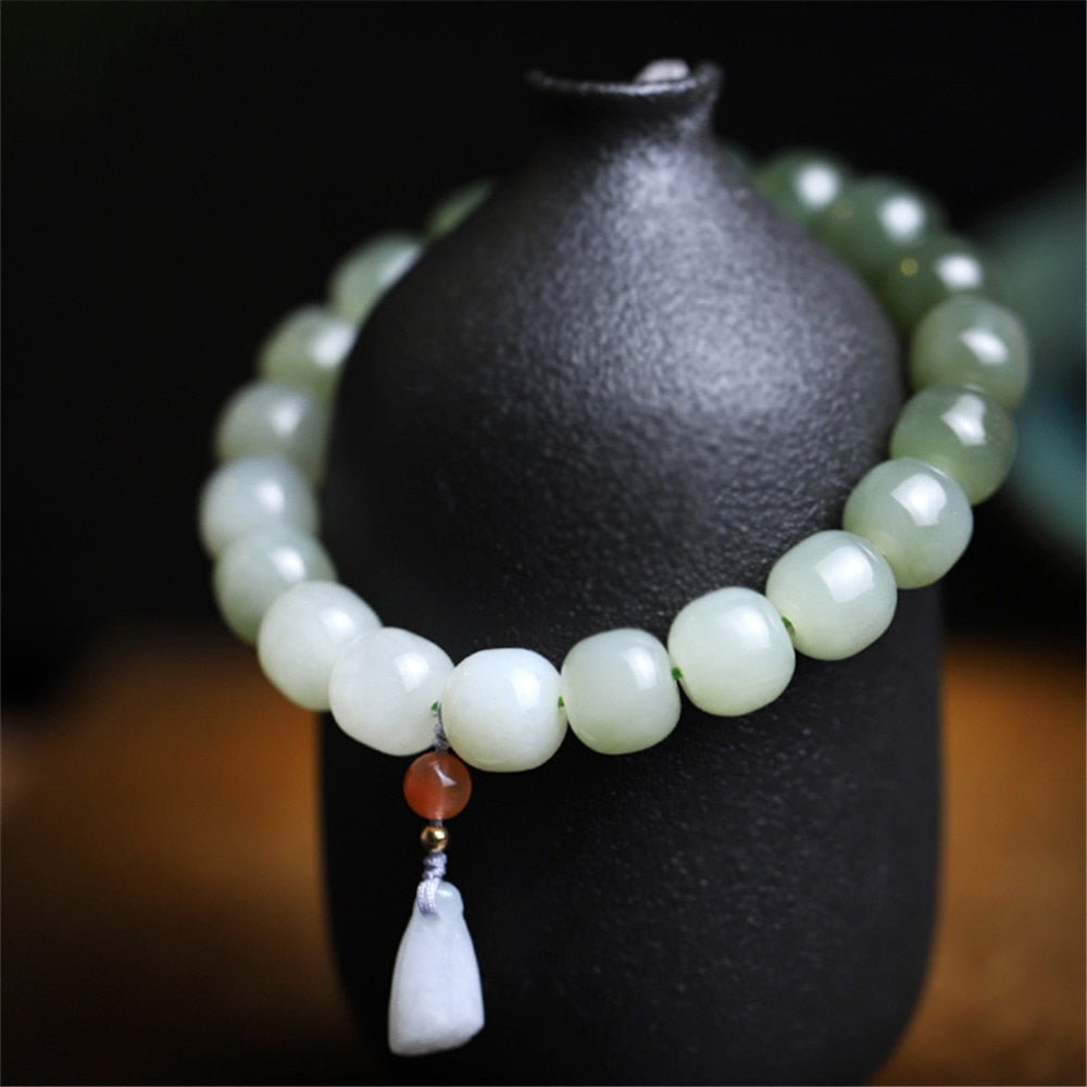 ䷊ Grande Paix • Le Đạo 道 du Changement avec la Racine de Lotus • Bracelet de Jade de la Montagne Qinghai